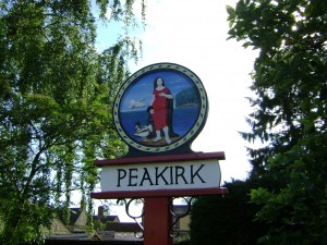 Peakirk sign - with St Pega